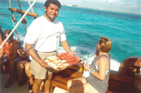 Pablo serving the tropical fruits